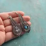 Серьги перо с гелиотисом
