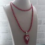 Сотуар из коралла с агатовой подвеской