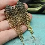 Дизайнерские серьги с цепочками и кристаллами